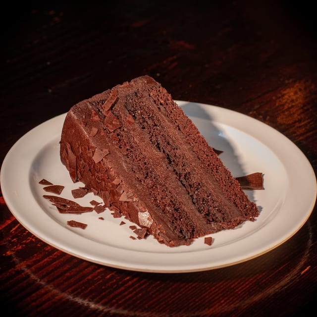 Big chocolate cake slice.